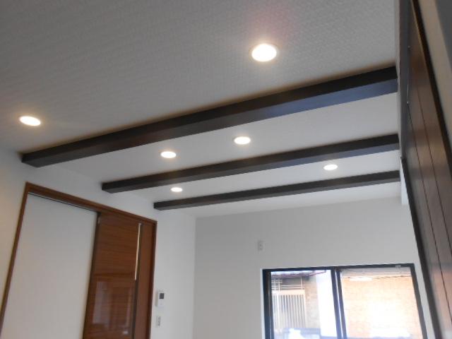 Living. It installed a large number downlight ceiling of the living room. Why not in combination with a stylish lighting fixture?