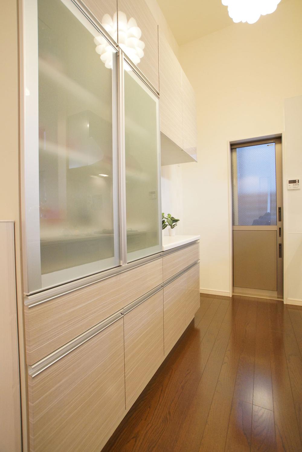 Kitchen. Neatly stored in the cupboard