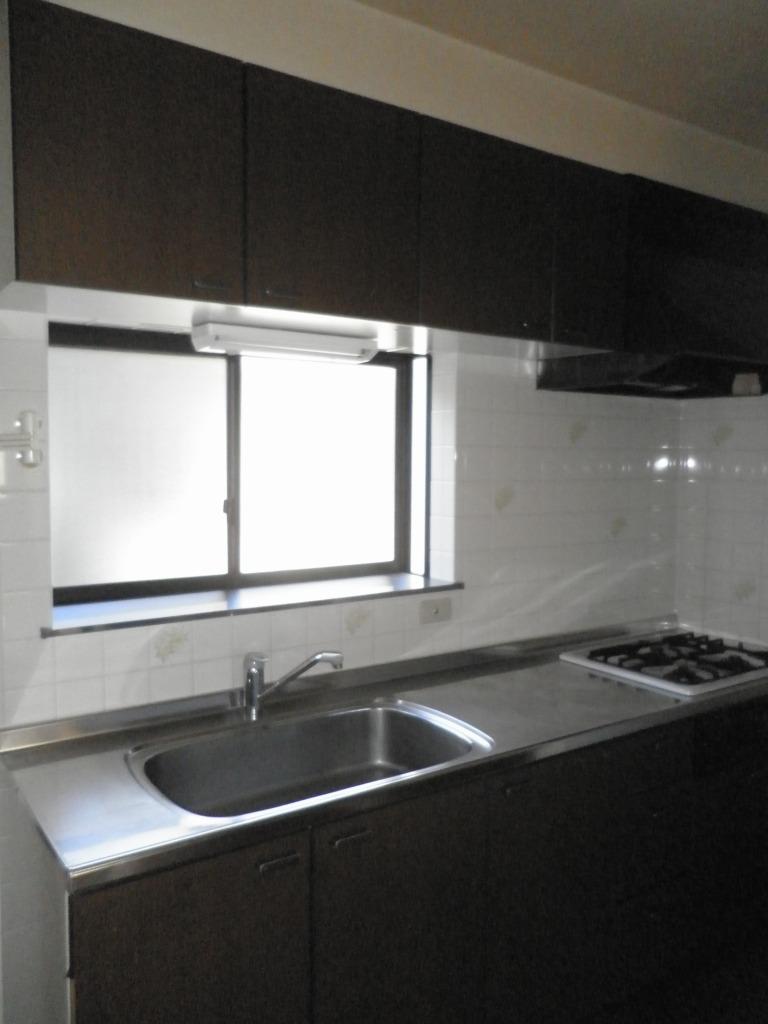 Kitchen. There is a window in the kitchen