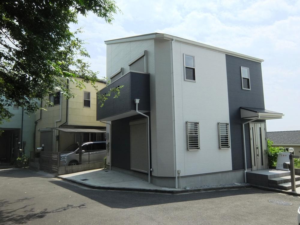 Local appearance photo. Local (July 2013) form nestled in shooting lush hill