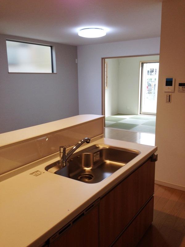 Kitchen. The entire living room overlooks from the kitchen