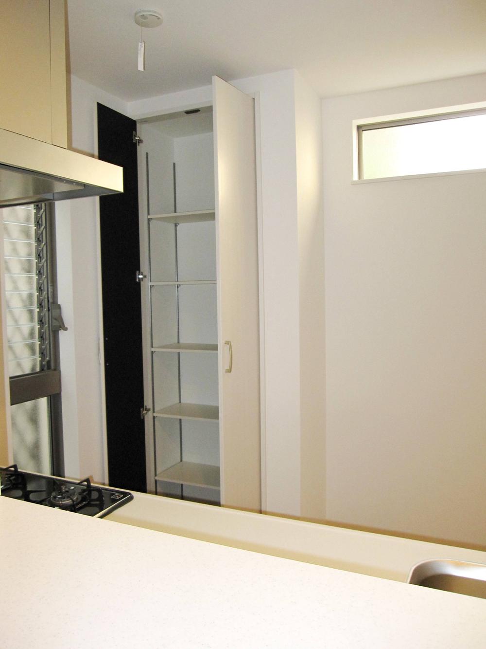 Receipt. Set up a pantry with shelves in the kitchen behind