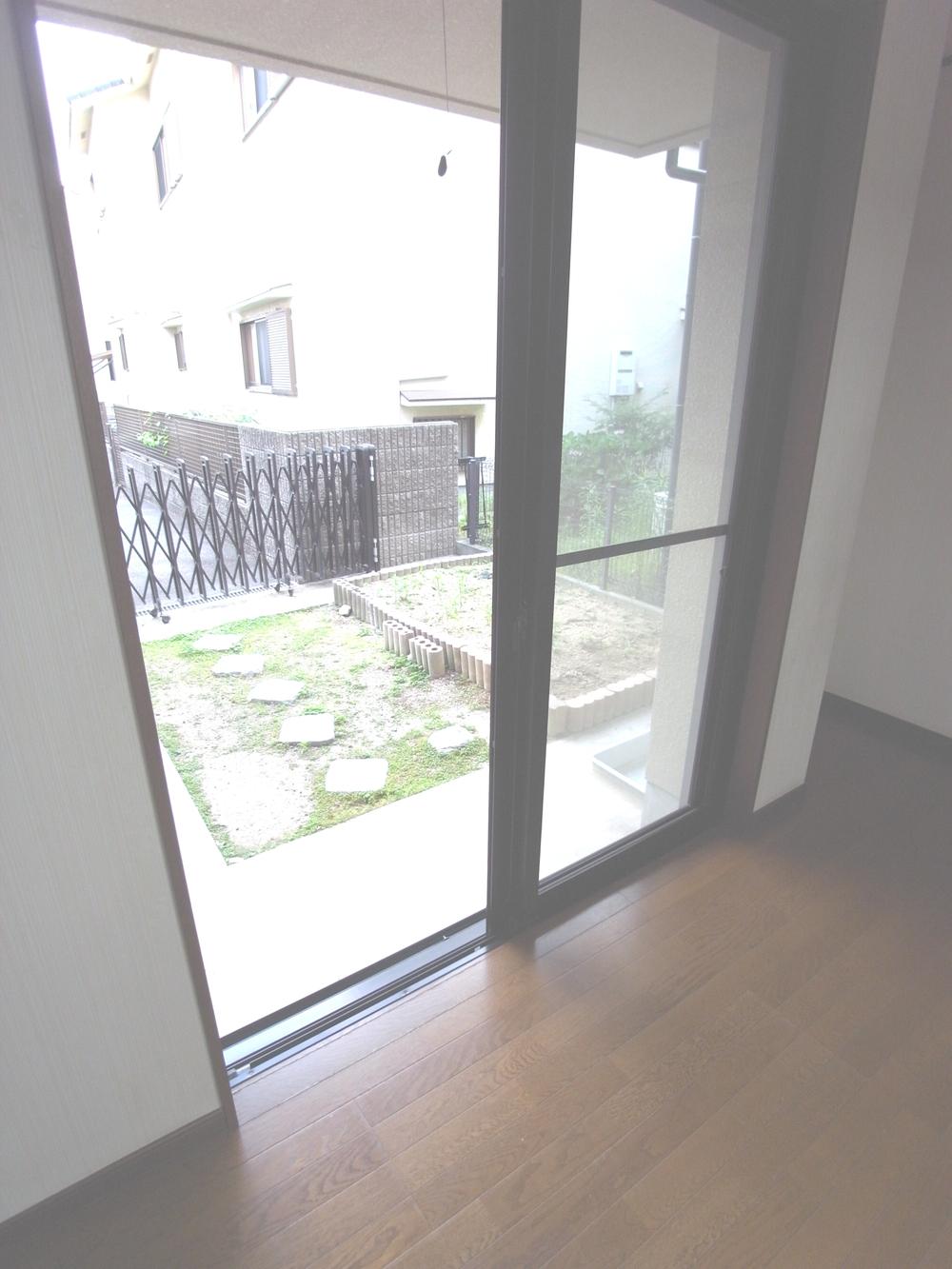 Living. Overlooking the garden from the living room