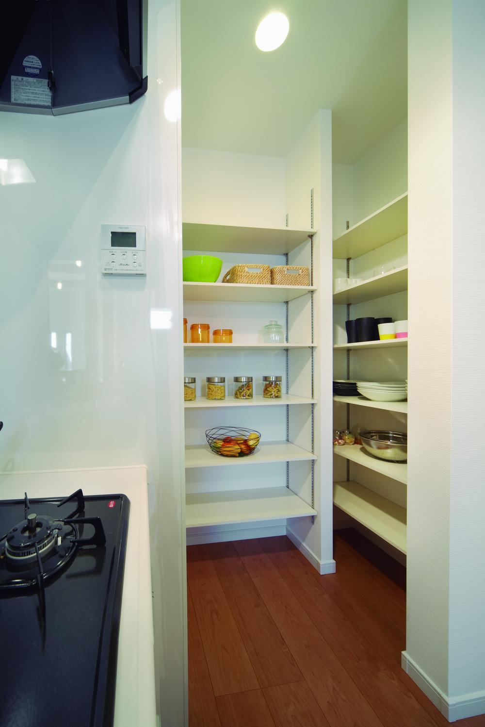 Model house photo. Good storage in a convenient kitchen next to the pantry