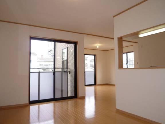 Living. Bright living room facing south-facing window!