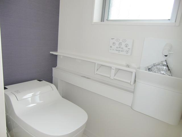 Toilet. With wash-basin is on the first floor toilet