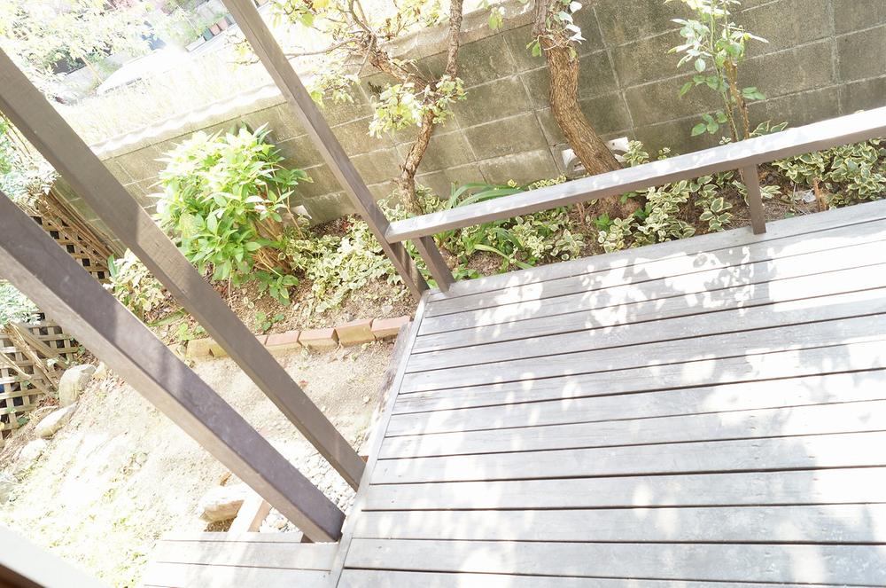 Garden. With wood deck! The back is a good day in the park! 