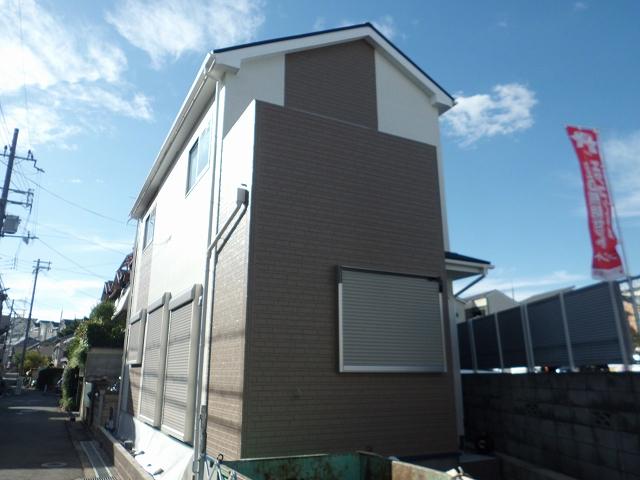 Local appearance photo. Site of spacious frontage facing the south