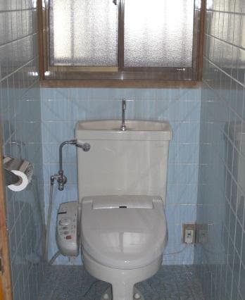 Toilet. Washlet is with