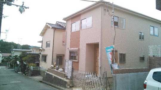 Local appearance photo. In front of the building is the subject real estate