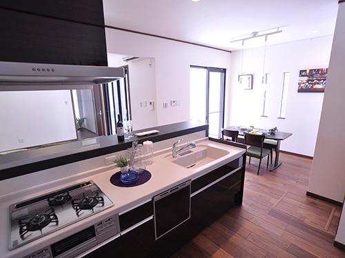Kitchen. While passing your favorite music in the yearning of the bar counter, Image of a hot restful adult time at home.