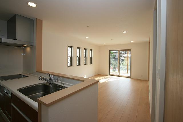Living. The other side of the large windows wood deck