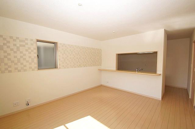 Living. In part of the living room wall was Hari eco-carat to clean the air (Image left side wall portion)