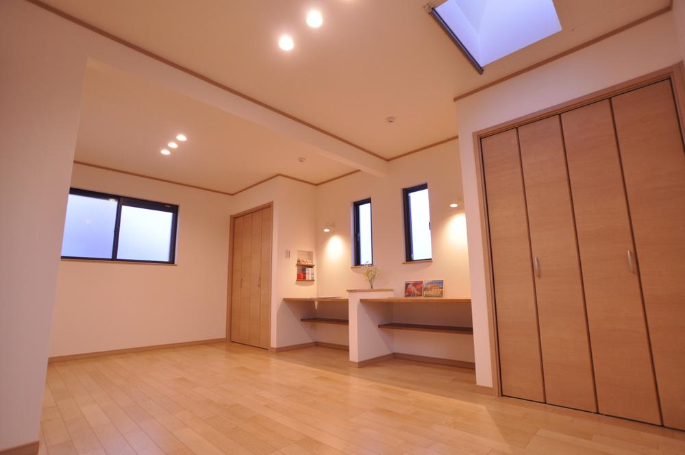 Model house photo. Bright children's room at the top light from the ceiling.