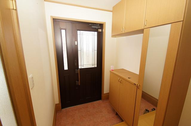 Entrance. Cross re-covered settled