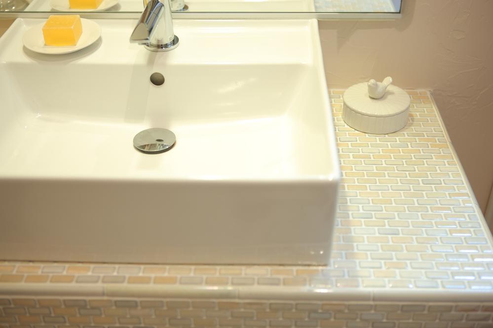 Other. You can construction of the mosaic tile put out a fun look to vanity.