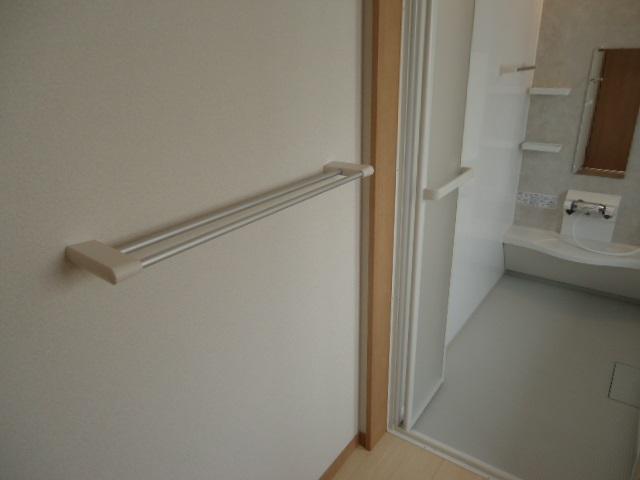 Wash basin, toilet. Handy towel with hook.