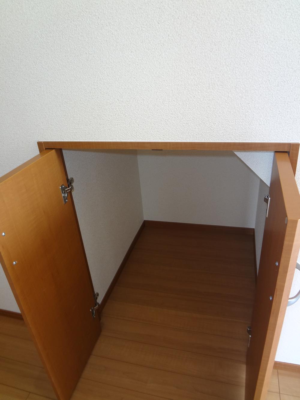 Receipt. The first floor is a staircase under storage.