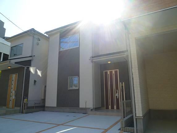 Local photos, including front road. Chic appearance of white and gray!