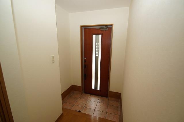 Entrance. Cross re-covered settled