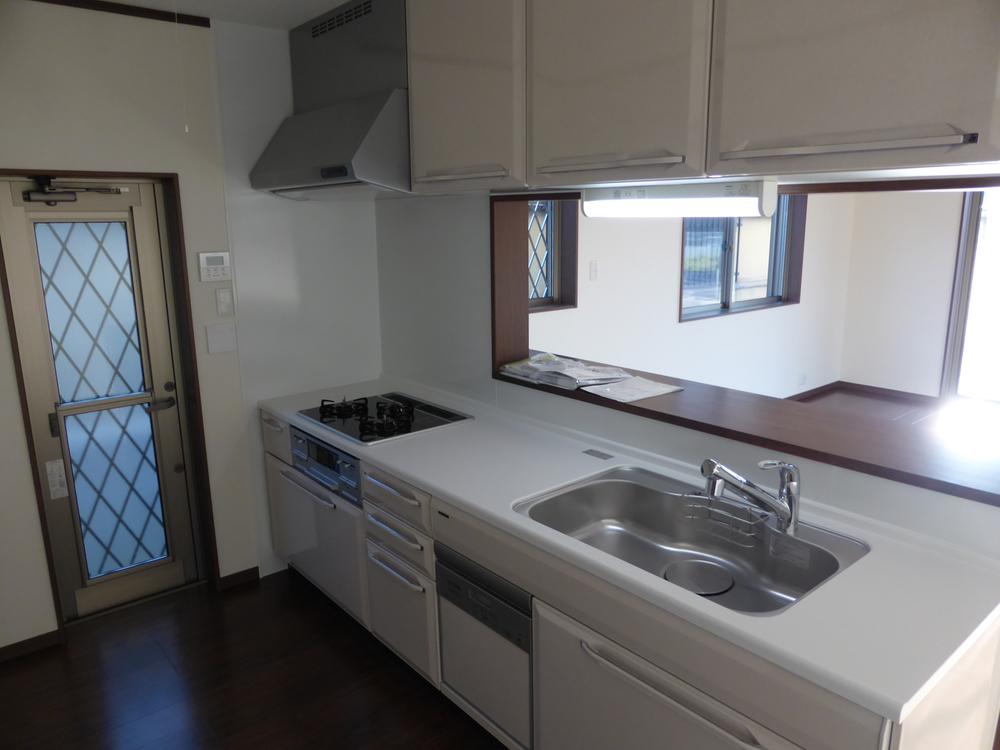 Kitchen. Counter kitchen with a back door