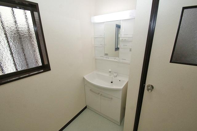 Wash basin, toilet. Vanity had made