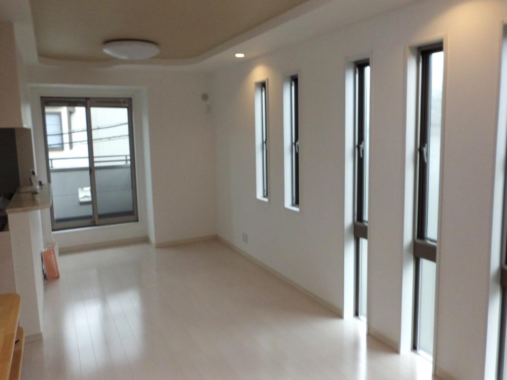 Living. Bright living room with many windows. 