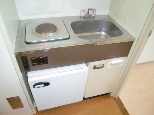 Kitchen. Electric stove ・ A kitchen with a mini-fridge