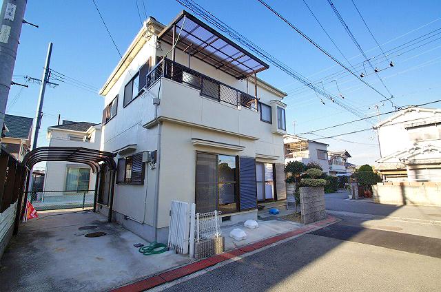 Local photos, including front road. It is the corner house