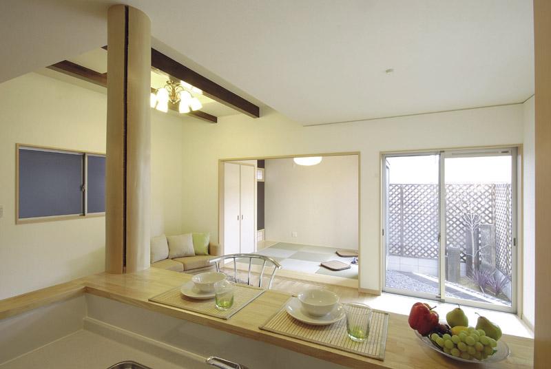 Kitchen. However a beam in some living room ceiling, It was realized to eliminate the design and feeling of pressure. (Our example of construction)