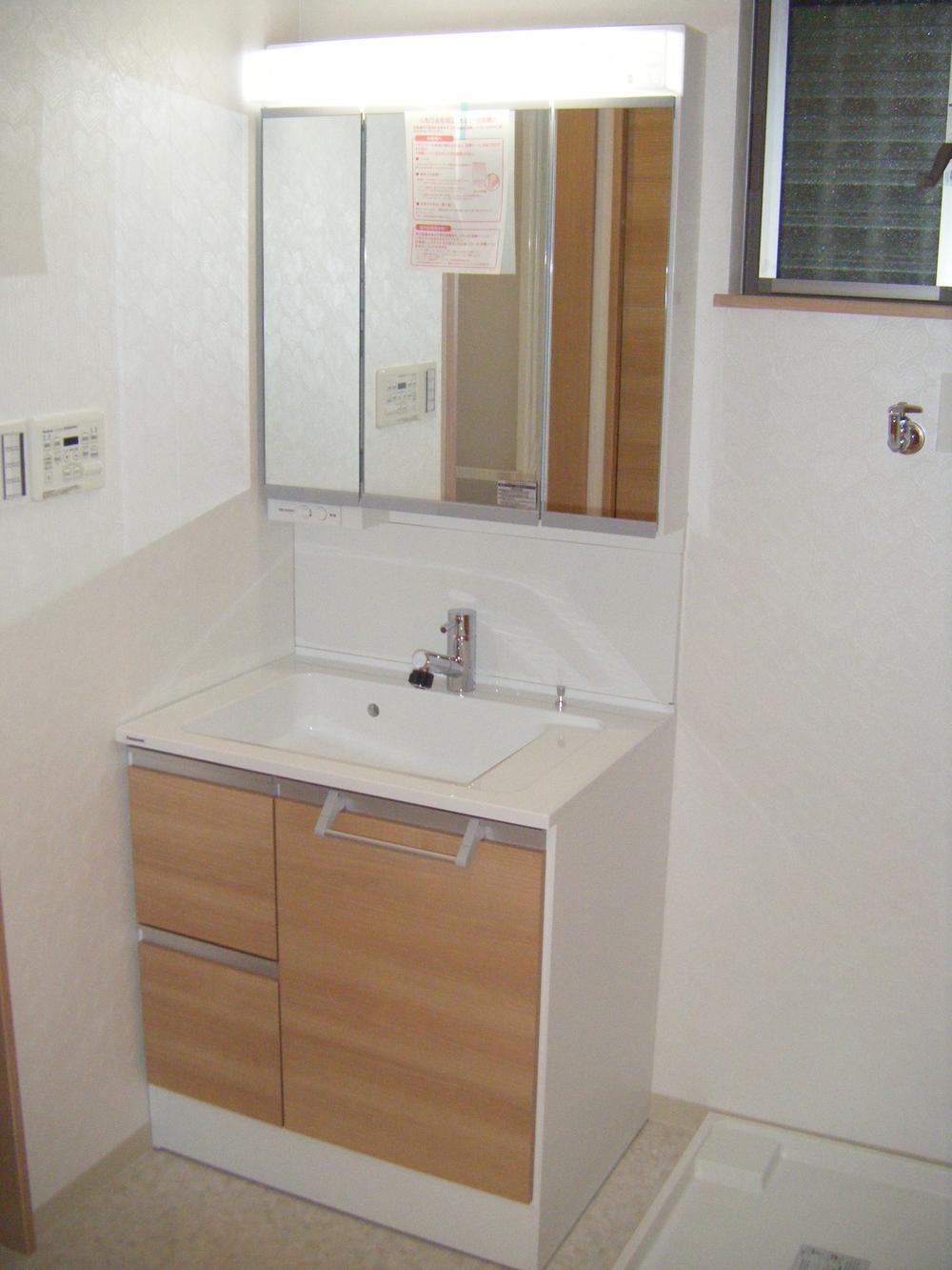 Wash basin, toilet. Panasonic made wash basin