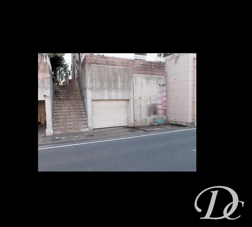 Parking lot. Shutter garage