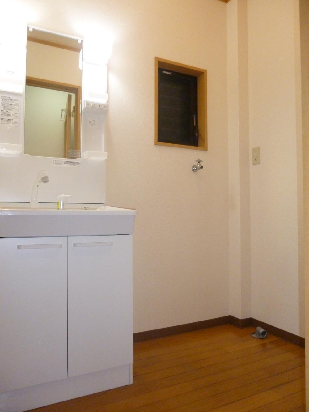 Wash basin, toilet. Shiny even wash dressing room