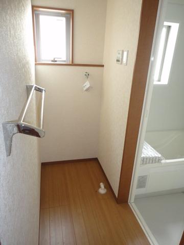 Wash basin, toilet. Building 2 Laundry Area