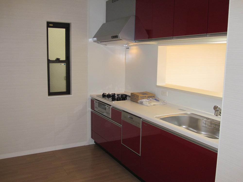 Kitchen. The kitchen is a glass top stove plus, It comes with a dishwasher. Panel is a mirror finish.