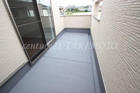 Balcony. Wide balcony! Also easy Jose laundry!