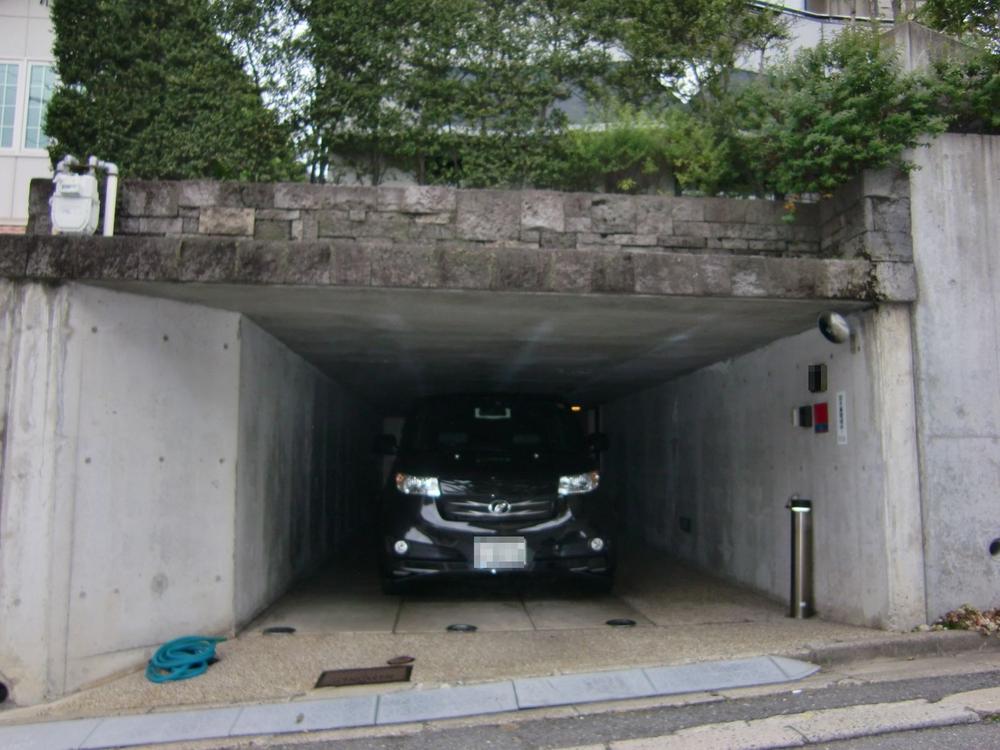 Parking lot. Garage dug-down that two can park