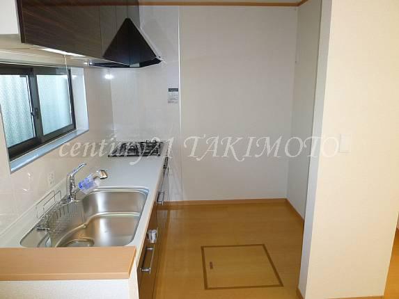 Kitchen. Light and into the hand there is a large window in front of the kitchen