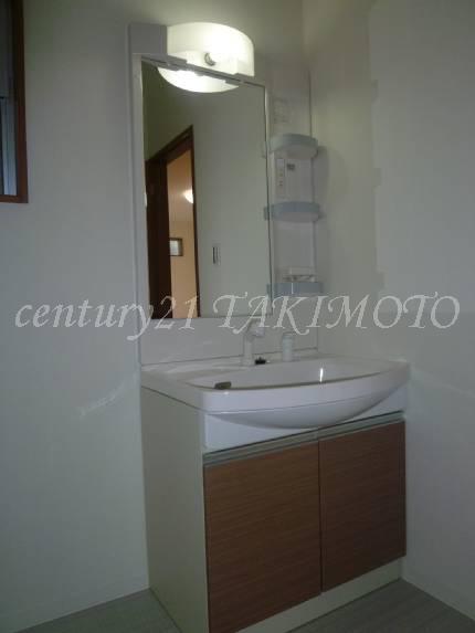 Wash basin, toilet. This unique wash basin