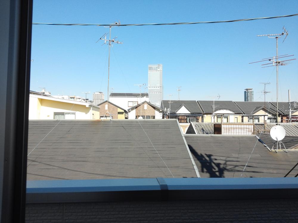 View photos from the dwelling unit. Abenobashi Terminal Building is visible from the balcony