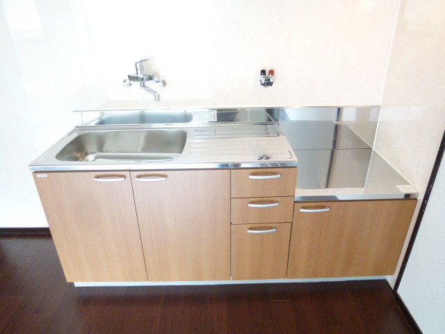 Other room space. Kitchen is a new article. 