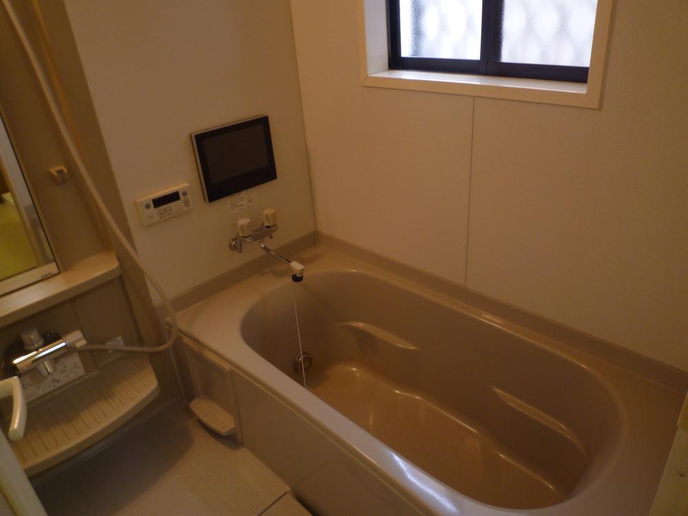 Bathroom. The bathroom is a TV with a 12in.