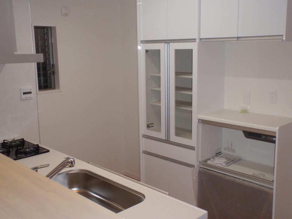 Model house photo. Cupboard standard equipment