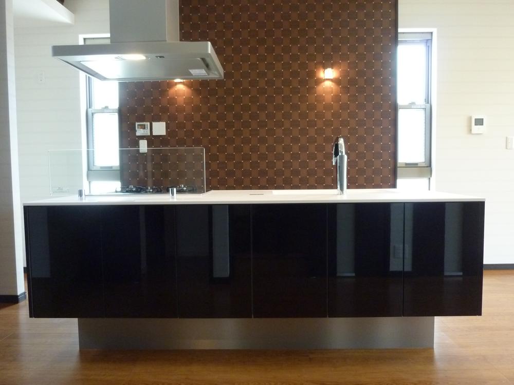 Kitchen. If dining is widely taken as, Island kitchen is recommended. The point can be approached from both sides.