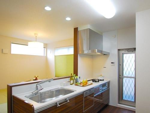 Kitchen. Set up a door to be out to the balcony in the kitchen next to, We put put the dust coming out from the kitchen