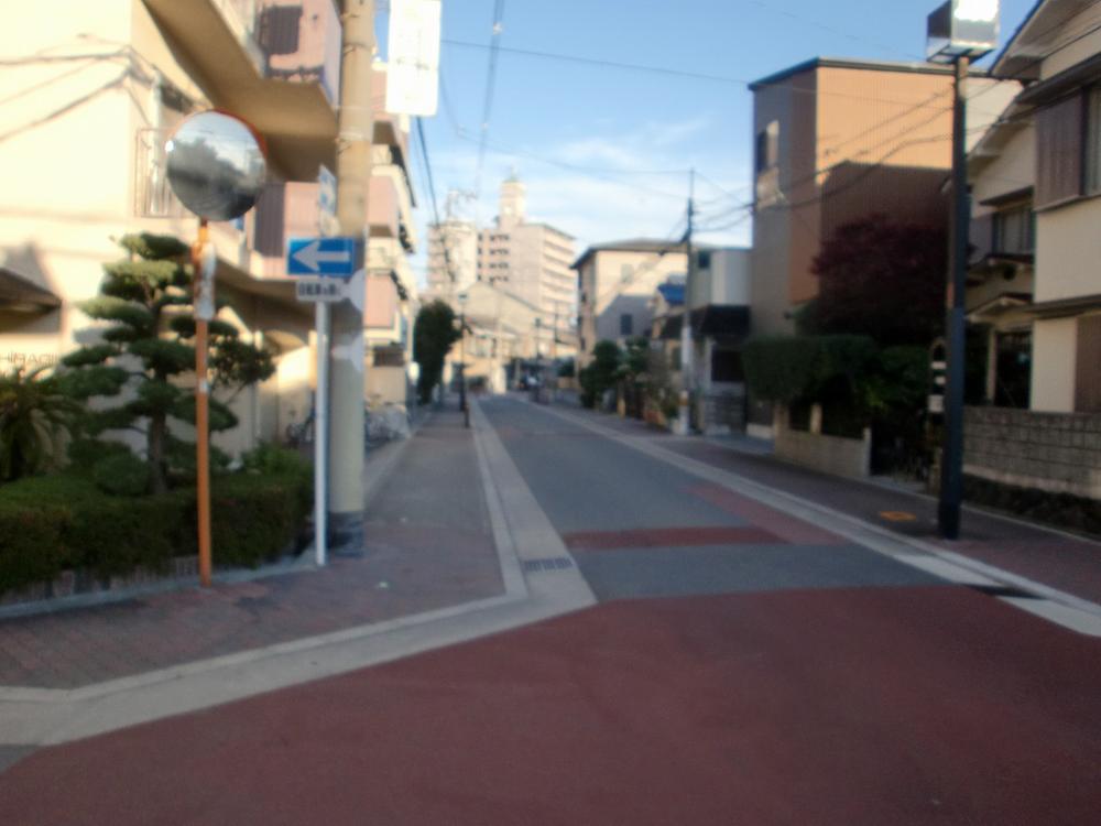 Other local. It is the way to the station. It is also peace of mind who is also bright woman street at night.