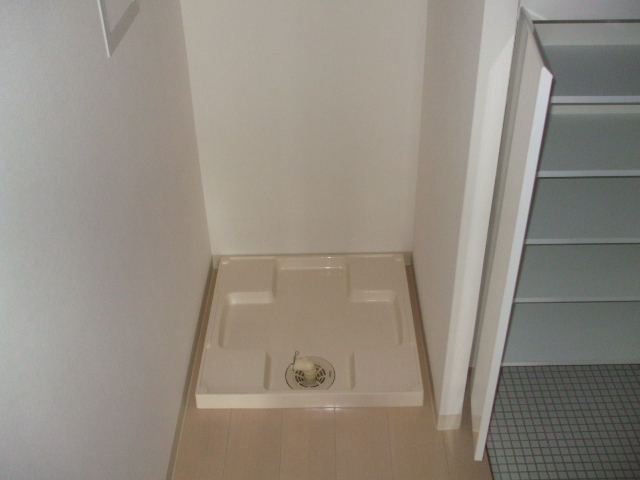 Other Equipment. Washing machine in the room