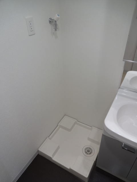 Other Equipment. Washing machine in the room