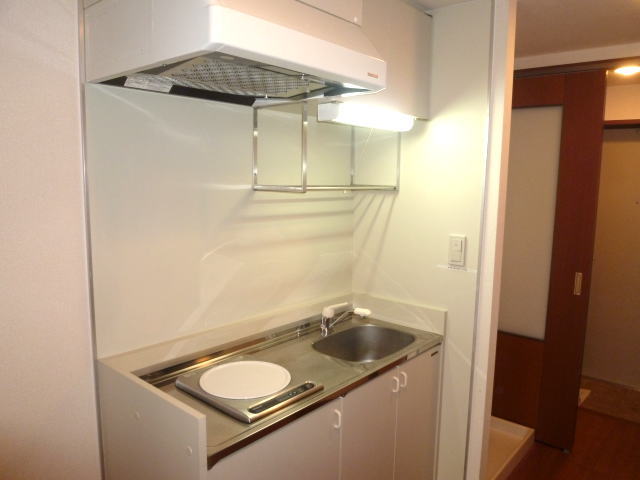Kitchen. IH with stove There is a refrigerator space