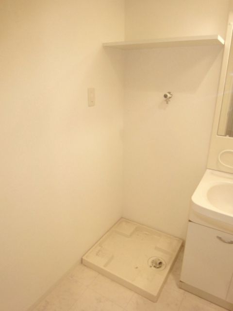 Other Equipment. Washing machine in the room